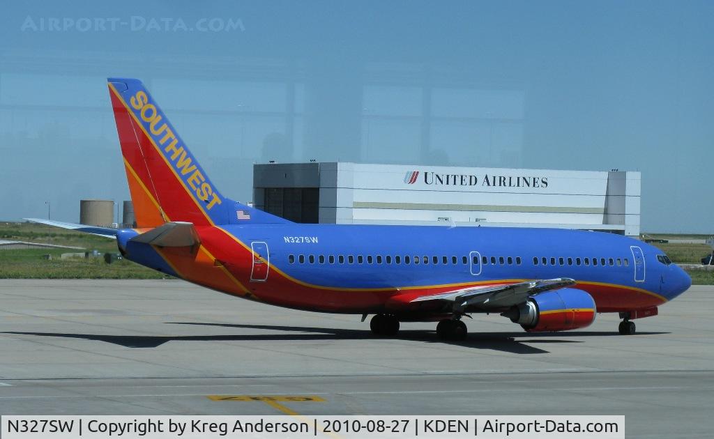 N327SW, 1987 Boeing 737-3H4 C/N 23691, Sorry for the window glare. Southwest Airlines Boeing 737-300 taxiing to the runway.