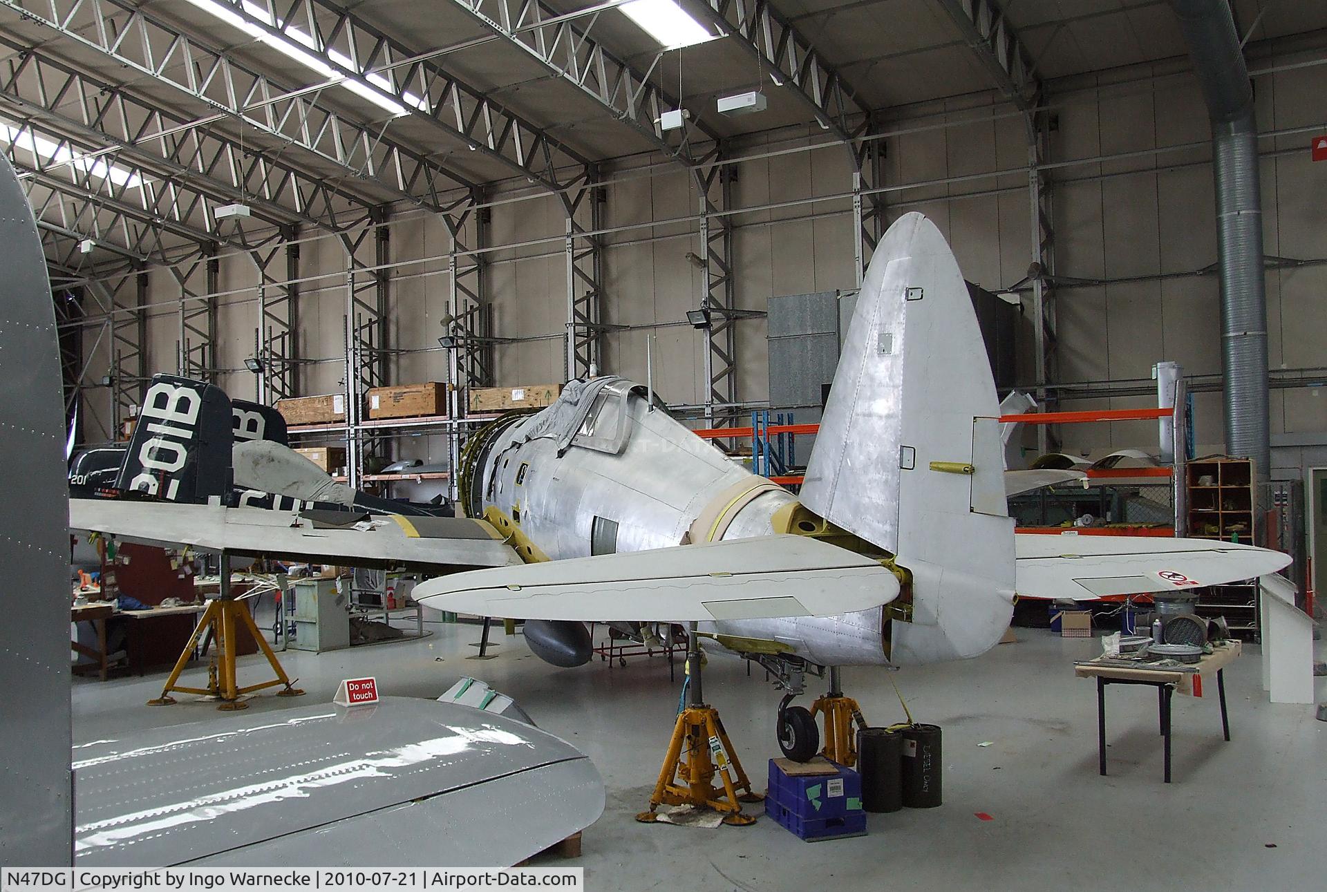 N47DG, 1942 Curtiss P-47G Thunderbolt C/N 21953, Republic (Curtiss) P-47G-10CU (P-47D-5-RE) Thunderbolt being worked on at the Imperial War Museum, Duxford