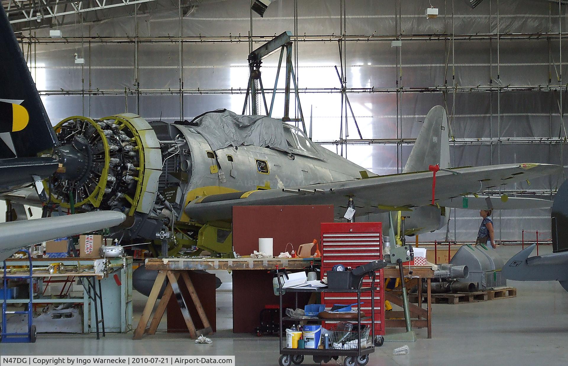 N47DG, 1942 Curtiss P-47G Thunderbolt C/N 21953, Republic (Curtiss) P-47G-10CU (P-47D-5-RE) Thunderbolt being worked on at the Imperial War Museum, Duxford