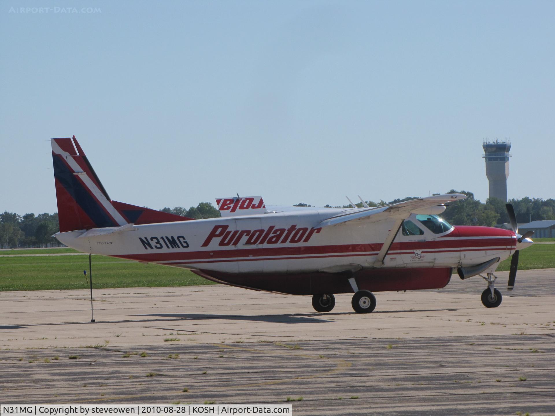 N31MG, 2004 Cessna 208B Grand Caravan C/N 208B1065, Basler Ramp KOSH