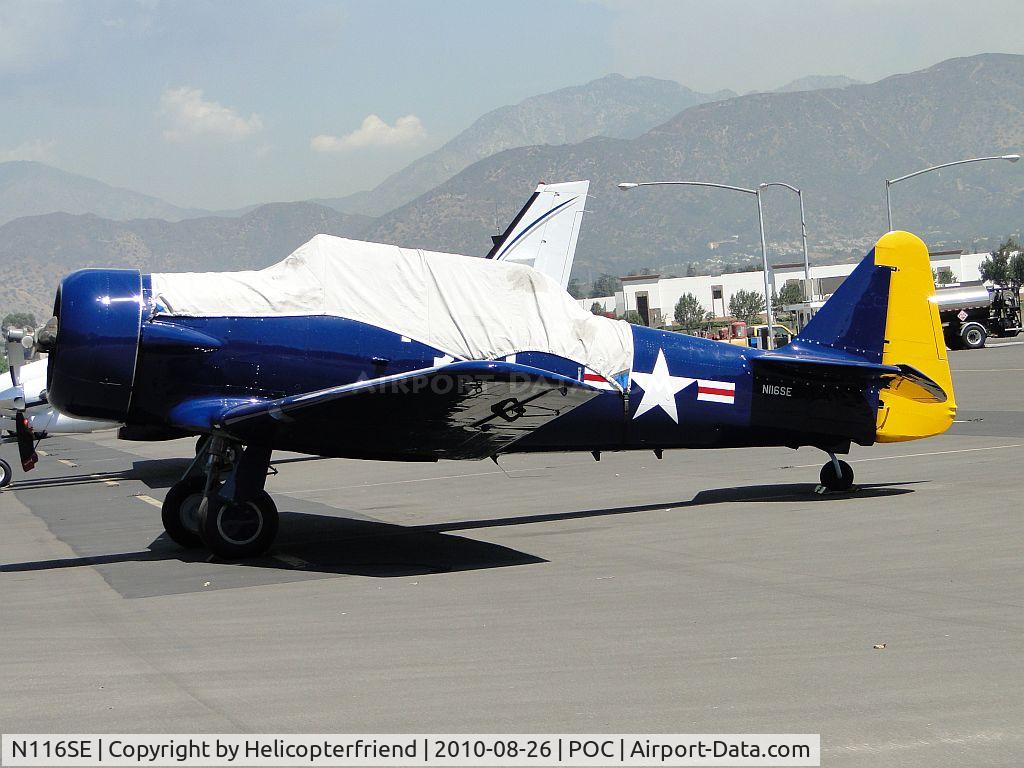 N116SE, 1959 North American T-6G Texan C/N 168-406, Parked in transient parking and covered to protect her from the sun