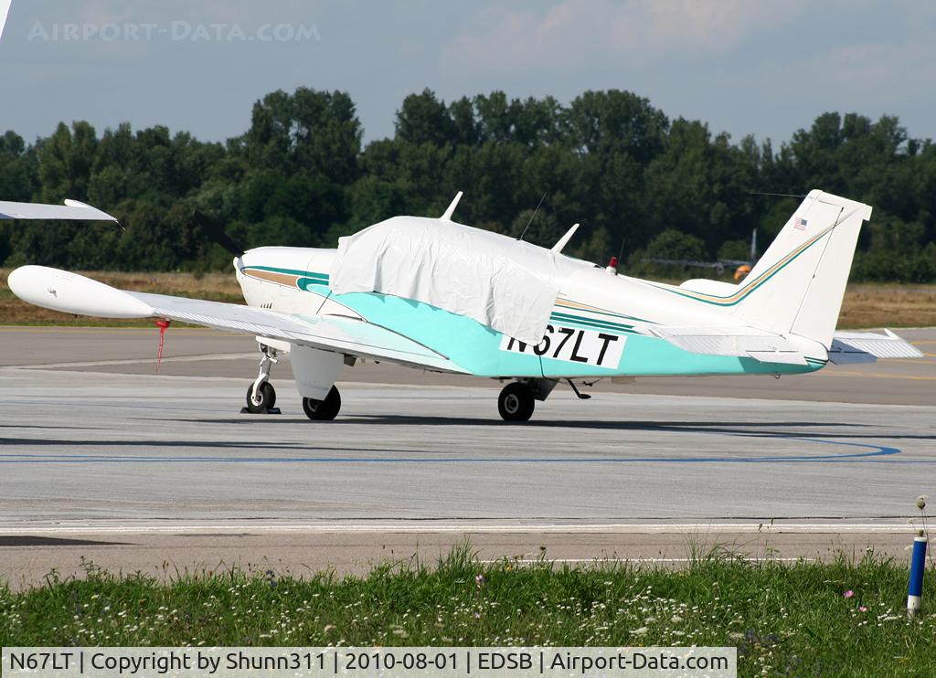 N67LT, Beech 35-C33 Debonair C/N CD-913, Parked at the General Aviation area...