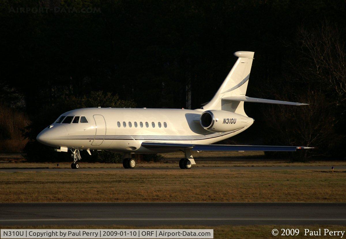 N310U, 2006 Dassault FALCON 2000EX C/N 100, Again, a Falcon awaits her turn