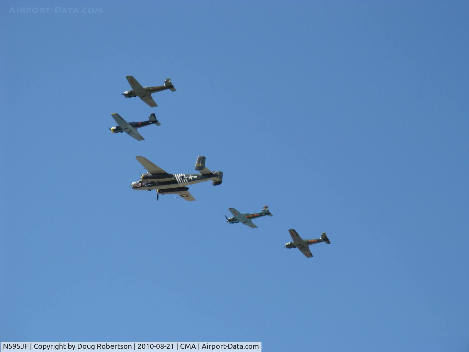 N595JF, 1969 Nanchang CJ-6A C/N 2532051, Four Nanchang China CJ-6As-N595JF, N9278F, N5566TR and N147M led in formation flight by N30801 TB-25N 'Executive Sweet'