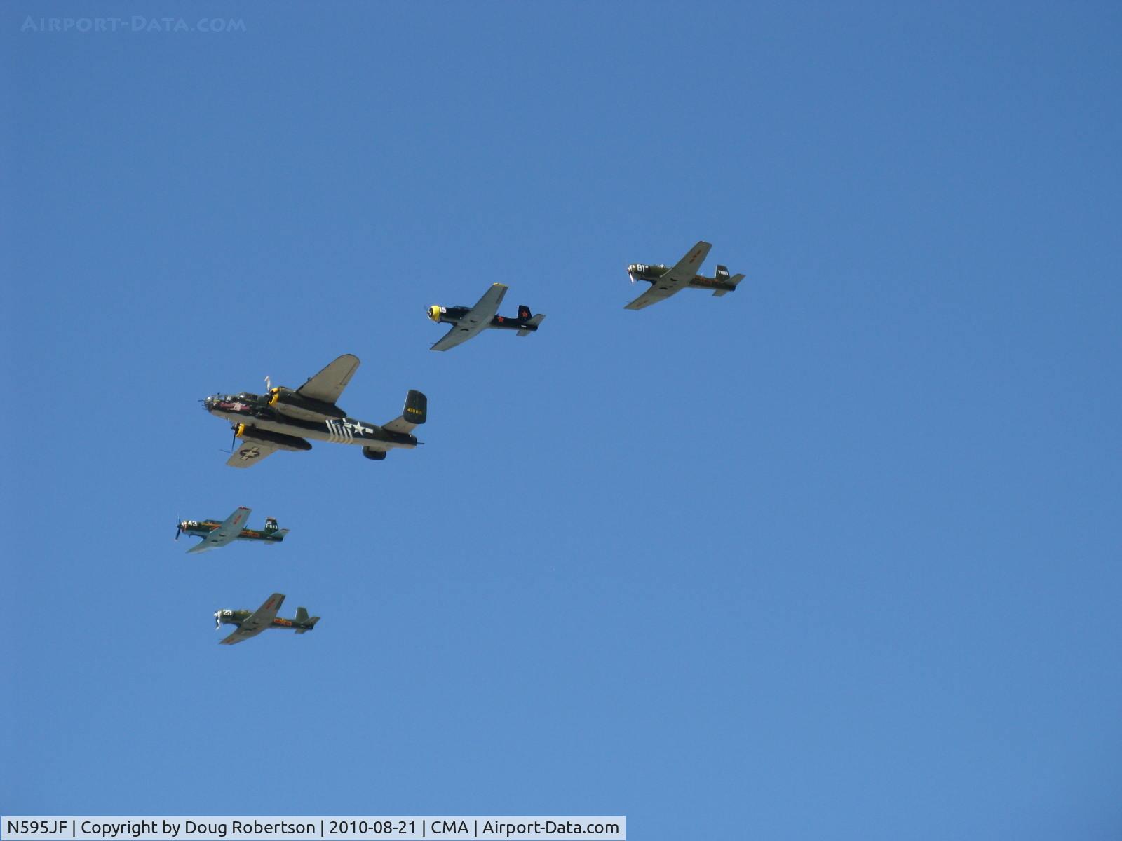 N595JF, 1969 Nanchang CJ-6A C/N 2532051, Four Nanchang China CJ-6As-N147M, N556TR, N9278F and N595JF led in formation flight by N30801 TB-25N 'Executive Sweet'