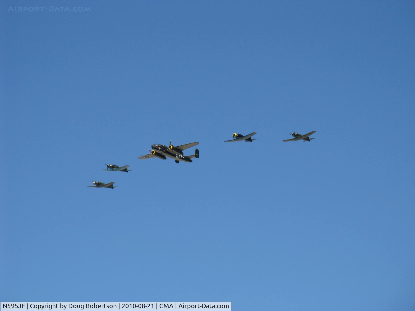 N595JF, 1969 Nanchang CJ-6A C/N 2532051, Four Nanchang China CJ-6As- N147M, N556TR, N9278F and N595JF led in formation flight by N30801 TB-25N 'Executive Sweet' 