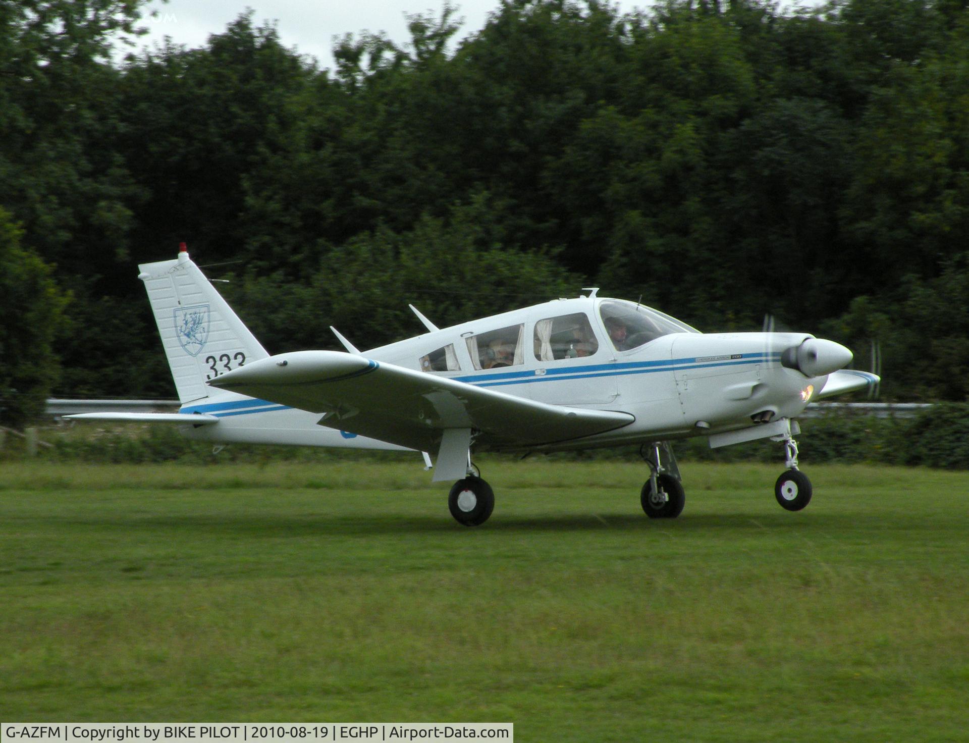 G-AZFM, 1971 Piper PA-28R-200 Cherokee Arrow C/N 28R-7135218, Fox Mike just getting airbourne rwy 26. Starlight Foundation Day