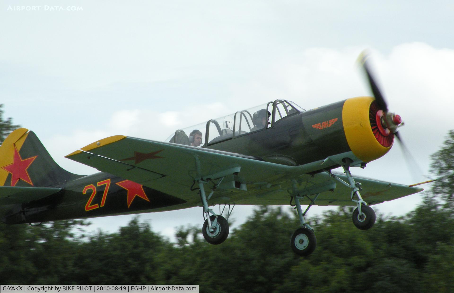 G-YAKX, 1991 Yakovlev (Aerostar) Yak-52 C/N 9111307, Resident Yak52 climbing away from rwy 26. Starlight Foundation Day