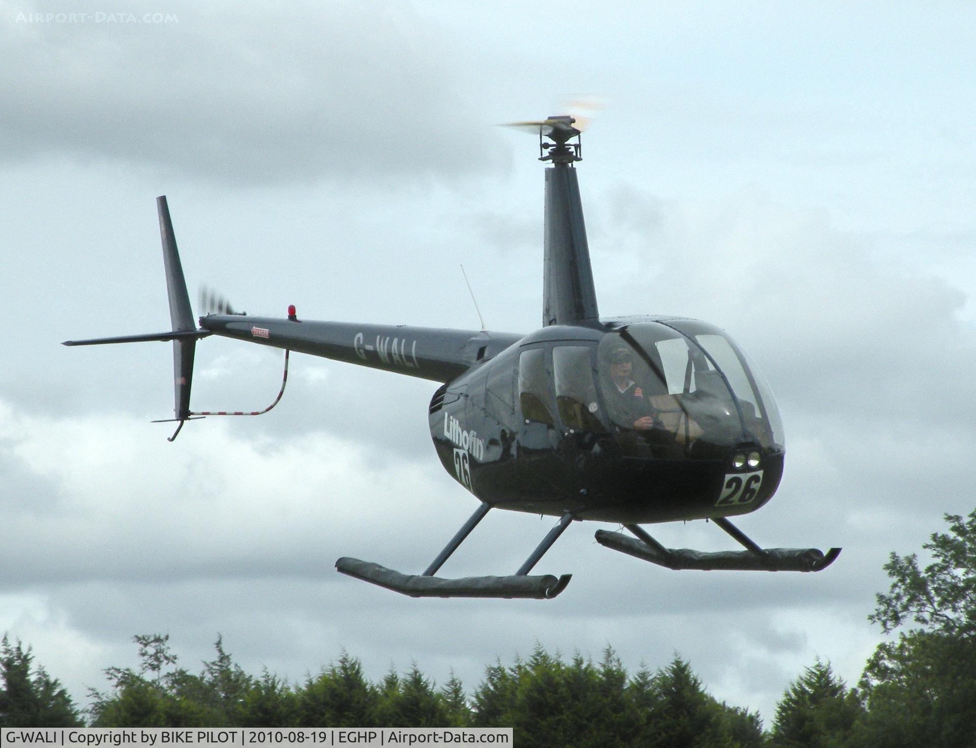 G-WALI, 2005 Robinson R44 II C/N 10849, Lima India heading to the pumps. Starlight Foundation Day