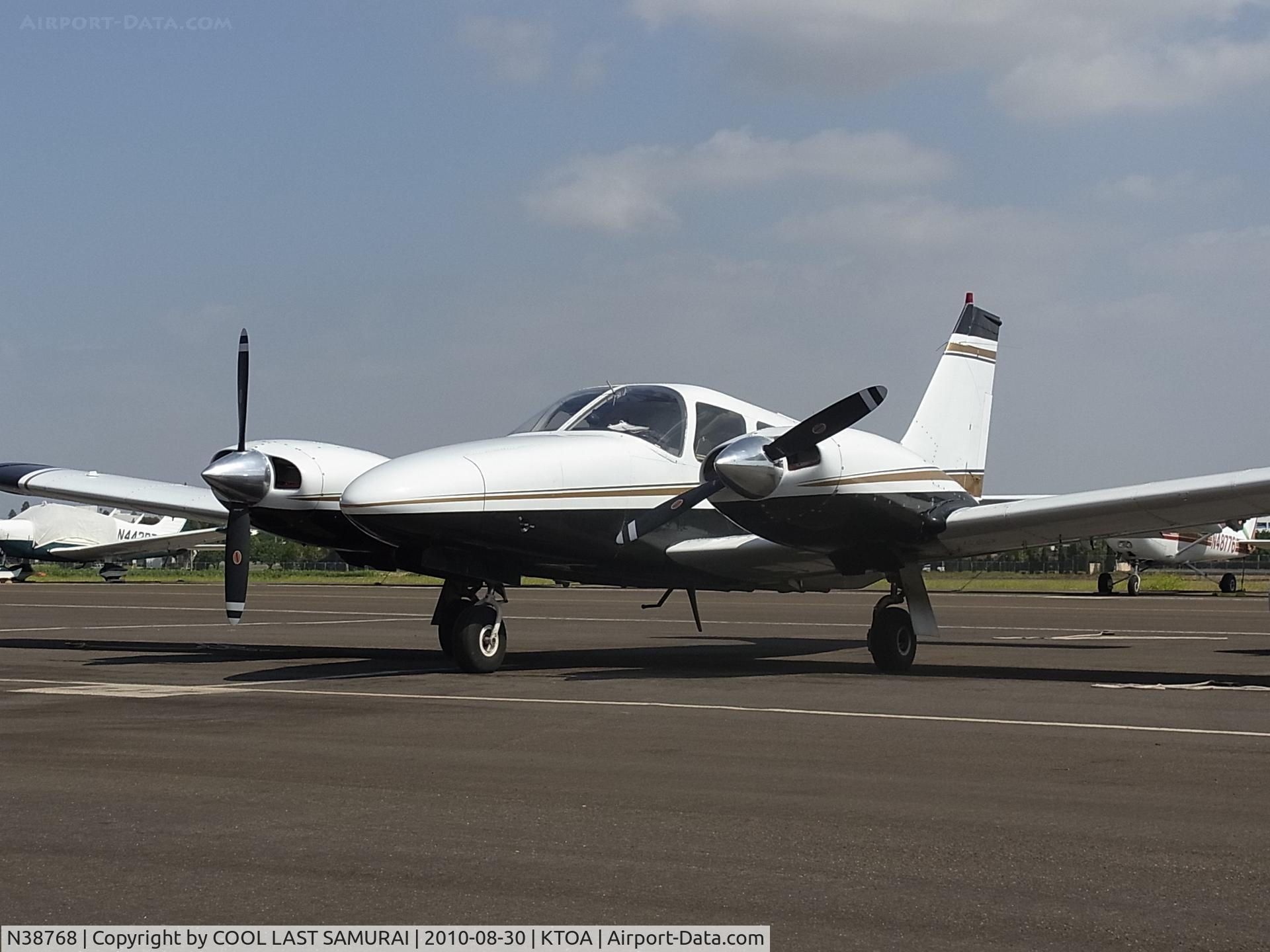 N38768, 1977 Piper PA-34-200T Seneca II C/N 34-7770085, Piper Seneca II at a TOA tie down spot.