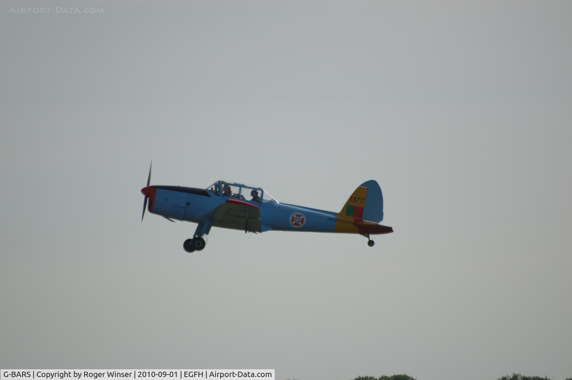 G-BARS, 1952 De Havilland DHC-1 Chipmunk T.10 C/N C1/0557, Previously WK520 now in Portuguese AF markings (1377). Departing Runway 10.