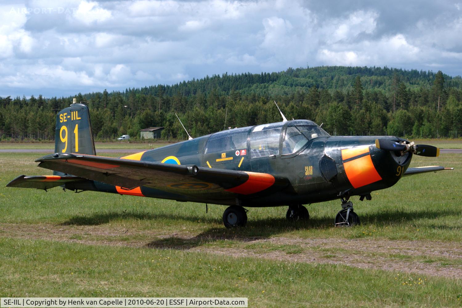 SE-IIL, 1952 Saab Sk.50B Safir (91B) C/N 91-211, Saab Safir parked on the grass at Hultsfred airport, Sweden.