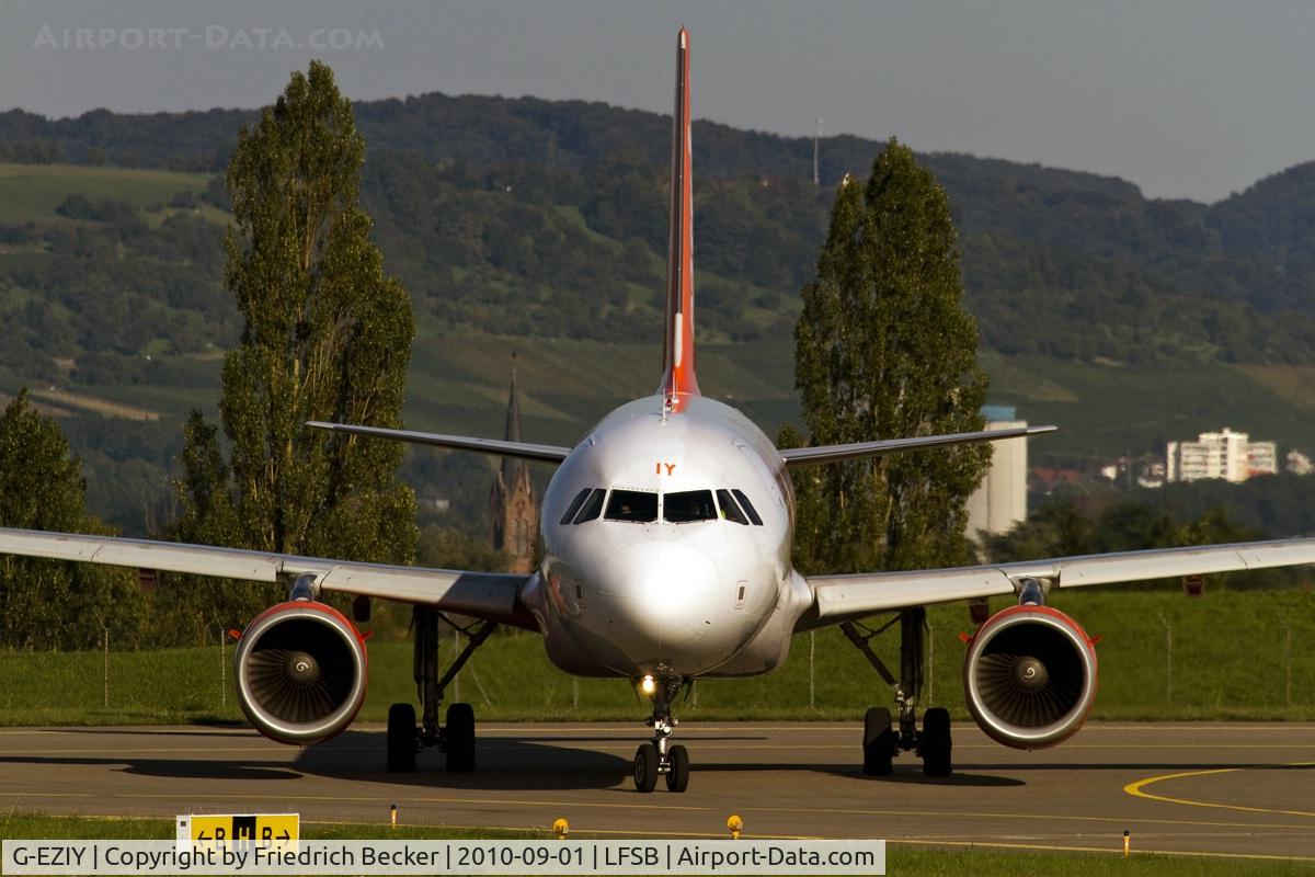 G-EZIY, 2005 Airbus A319-111 C/N 2636, taxying to the active