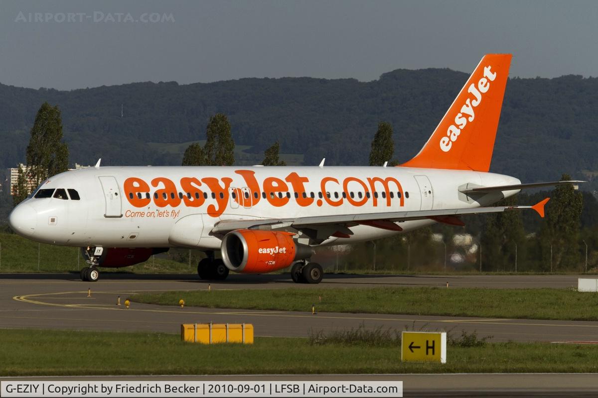 G-EZIY, 2005 Airbus A319-111 C/N 2636, taxying to the active