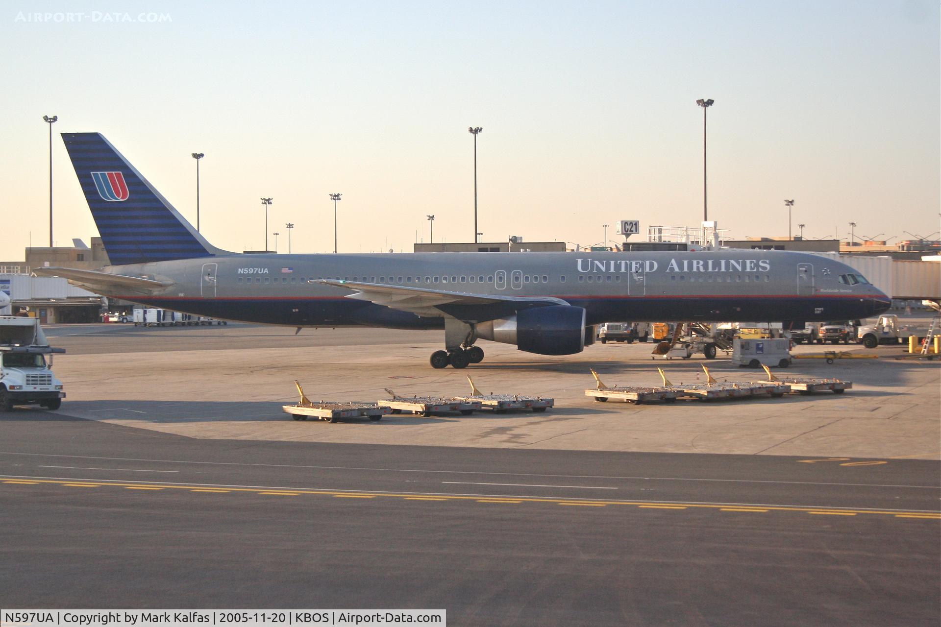 N597UA, 1998 Boeing 757-222 C/N 28750, United Airlines Boeing 757-222, N597UA at C21 KBOS, next stop is KSFO.
