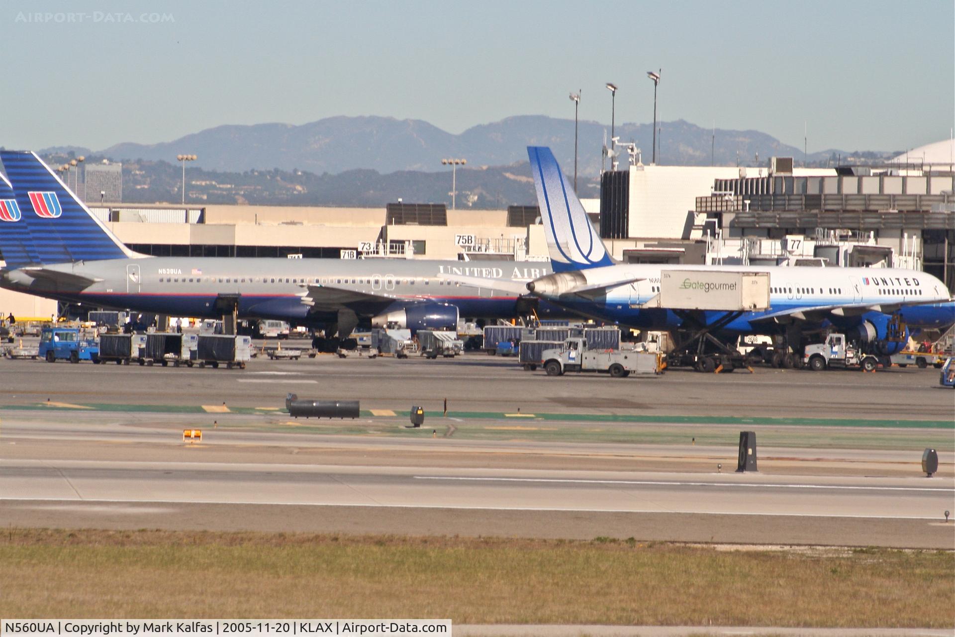 N560UA, 1992 Boeing 757-222 C/N 26660, United Airlines Boeing 757-222, N560UA at gate 77 KLAX parked next to N538UA at gate 75B.