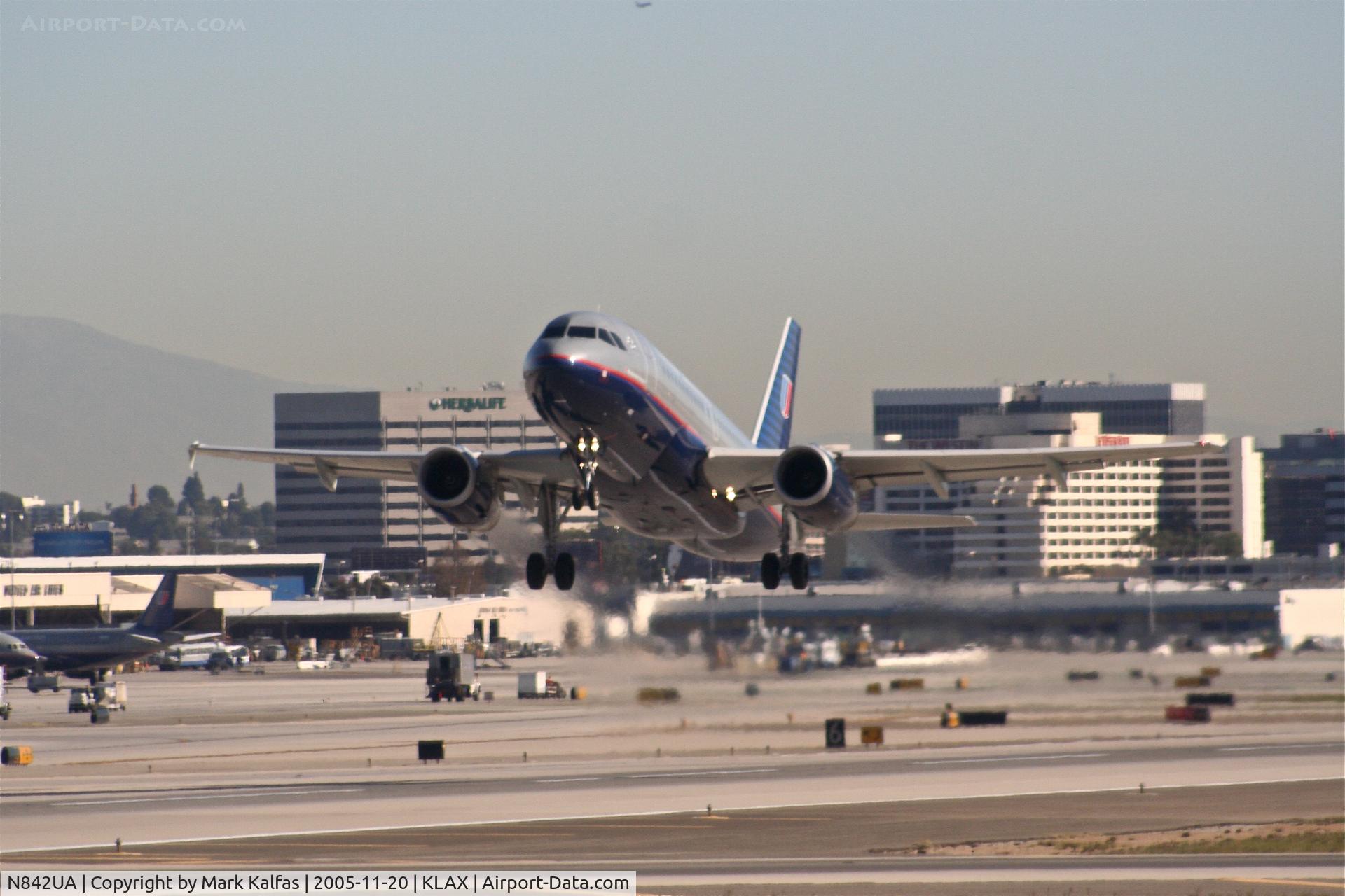 N842UA, 2001 Airbus A319-131 C/N 1569, United Airlines Airbus A319-131, N842UA departing 25R KLAX.