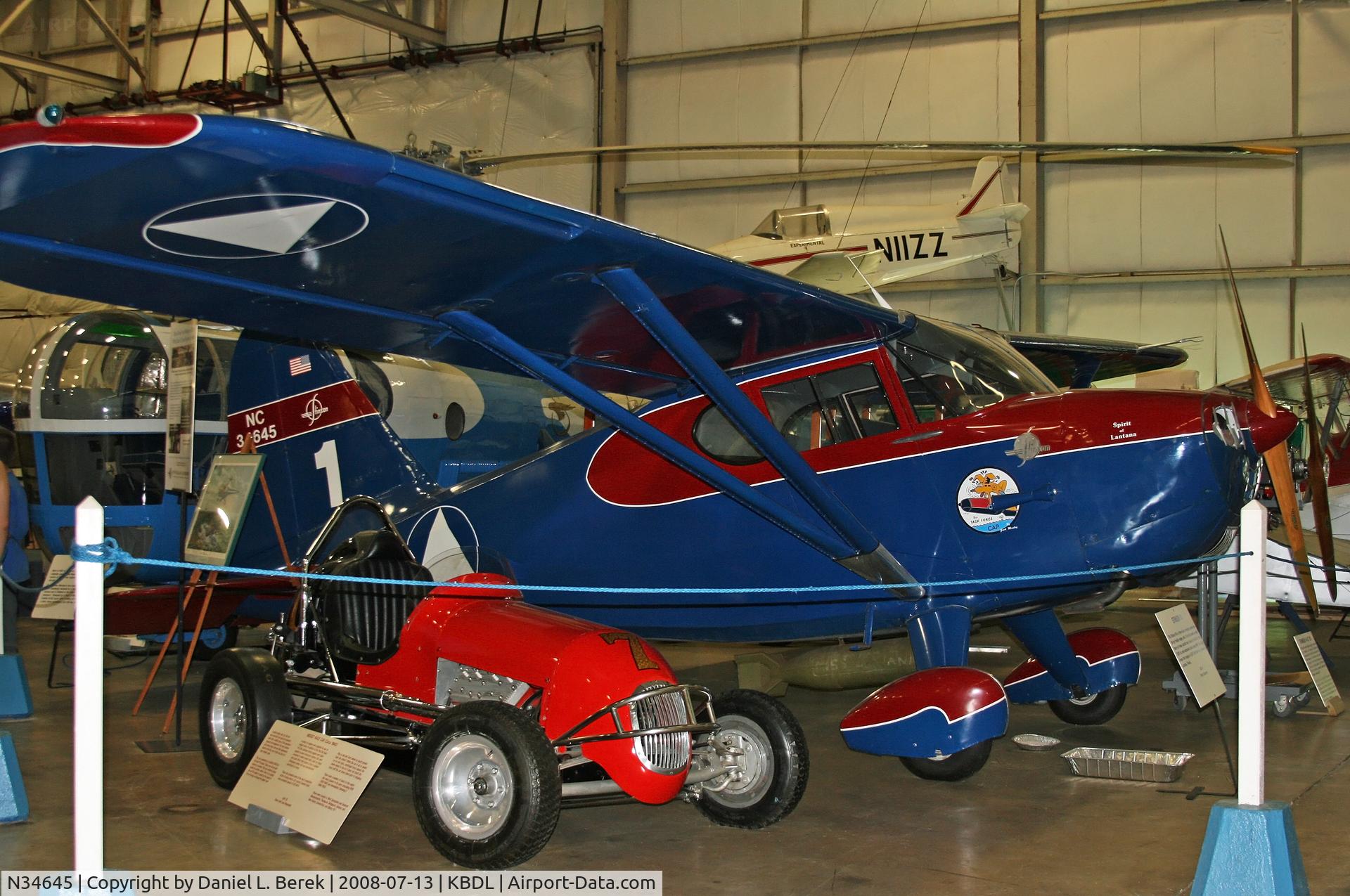 N34645, 1941 Stinson 10A C/N 8045, Resplendent in World War II CAP markings, this beuatiful Stinson is on display at the New England Air Museum.
