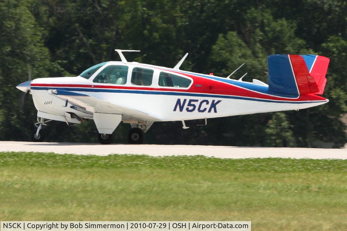 N5CK, 1974 Beech V35B Bonanza C/N D-9693, Departing Airventure 2010 - Oshkosh, Wisconsin