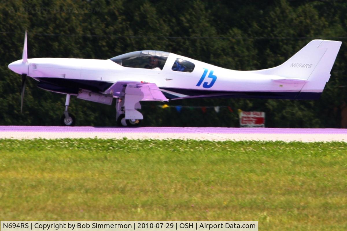 N694RS, 2006 Lancair 235/320 C/N 105, Departing Airventure 2010 - Oshkosh, Wisconsin