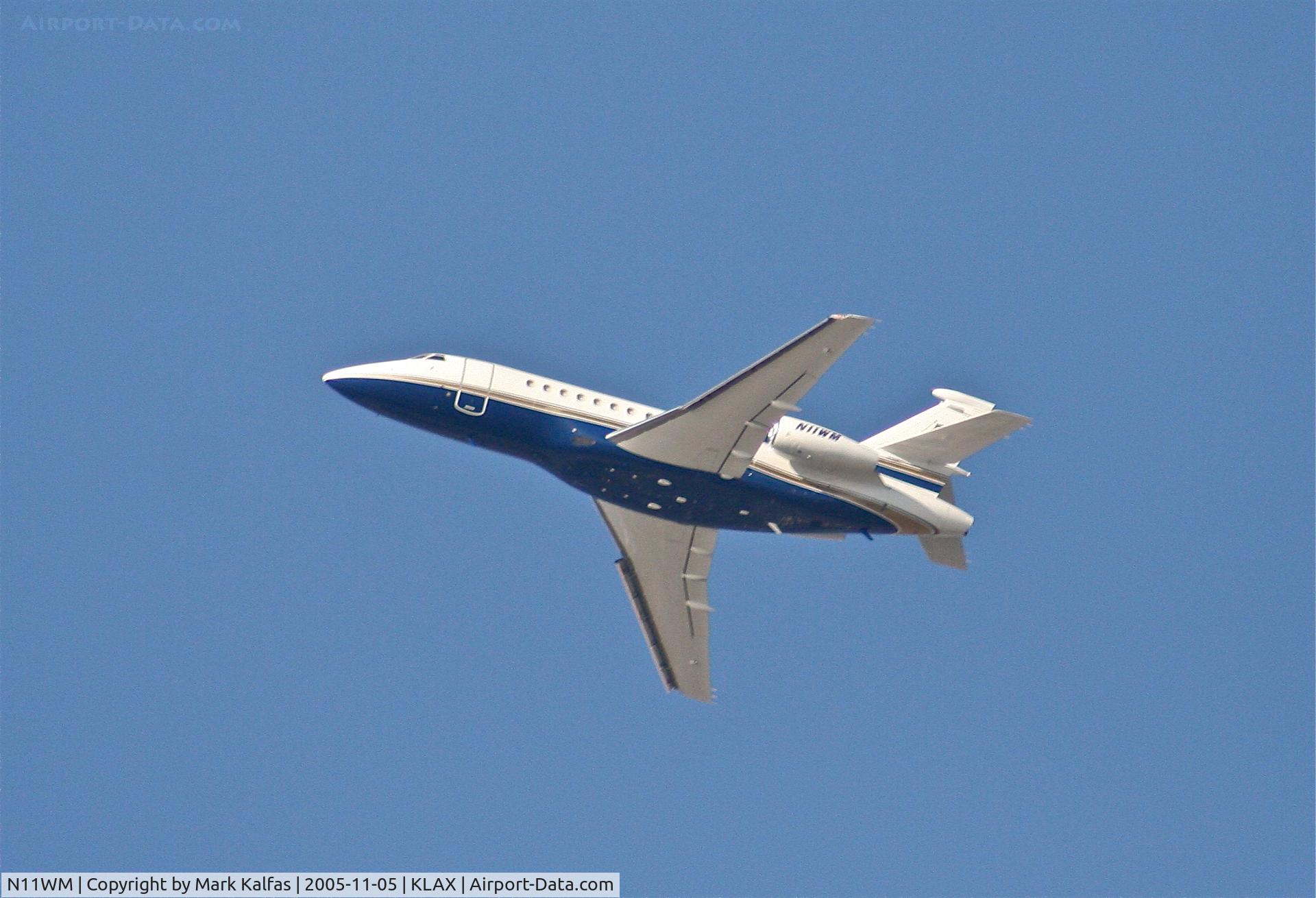 N11WM, 1999 Dassault Falcon 900EX C/N 58, AZAAIR Dassault FALCON 900 EX, N11WM departing 25R KLAX.