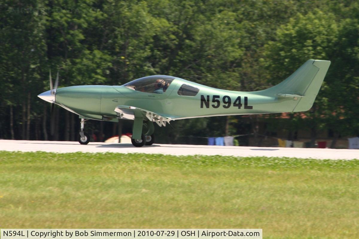 N594L, Johnson Dale R LEG2 C/N 218, Departing Airventure 2010 - Oshkosh, Wisconsin