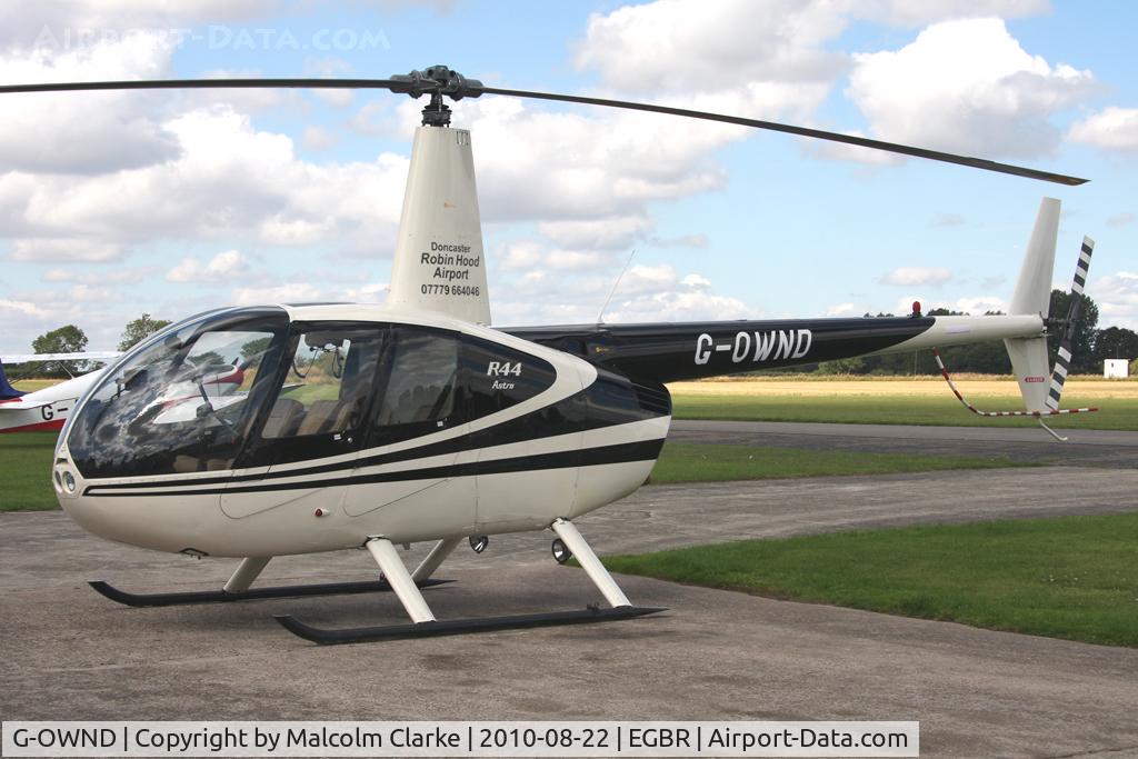 G-OWND, 1999 Robinson R44 Astro C/N 0644, Robinson R44 Astro at Breighton Airfield's Summer Madness All Comers Fly-In in August 2010.