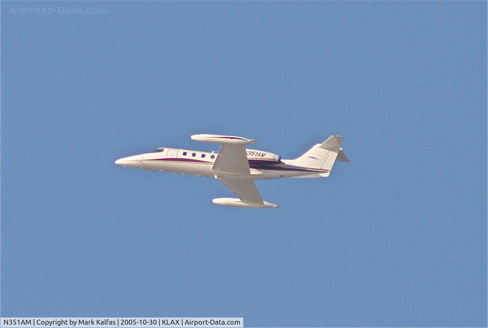 N351AM, 1981 Learjet 35A C/N 35A-409, CHALLENGER ONE HOLDINGS Gates Learjet Corp. 35A, N351AM departing 25L KLAX.