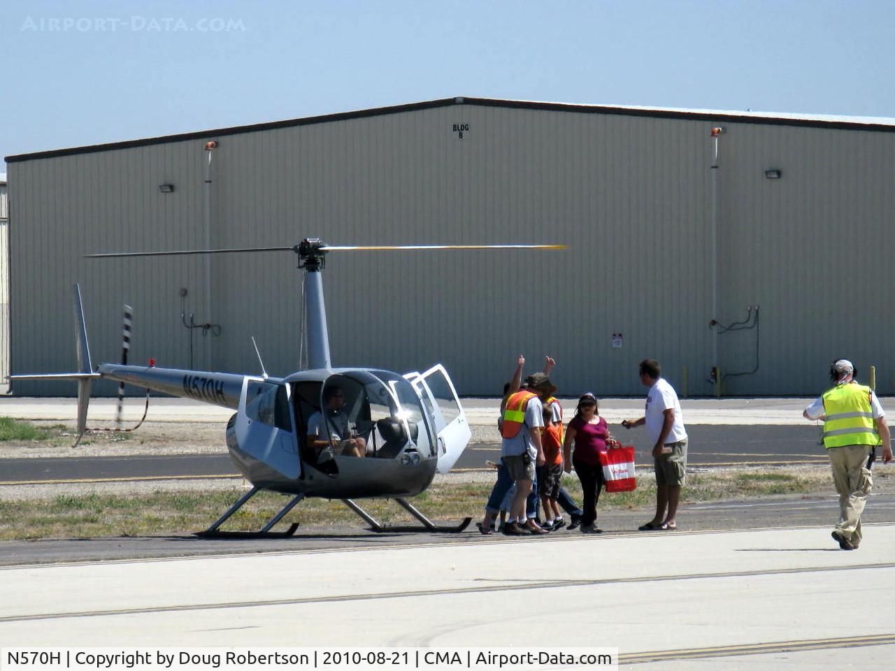 N570H, Robinson R44 C/N 2016, 2009 Robinson R44 RAVEN II, Lycoming IO-540-F1B5 derated to 245 Hp for 5 minutes, 205 Hp continuous, providing rides at Wings Over Camarillo 2010.