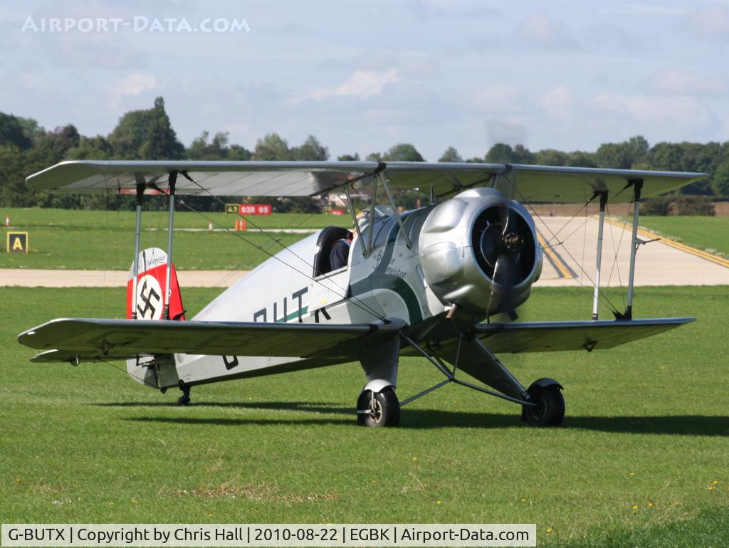 G-BUTX, 1940 Bucker Bu-133C Jungmeister C/N ES.1-4, at the Sywell Airshow