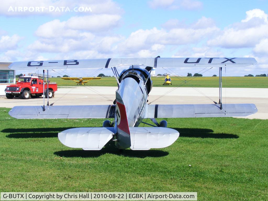 G-BUTX, 1940 Bucker Bu-133C Jungmeister C/N ES.1-4, at the Sywell Airshow