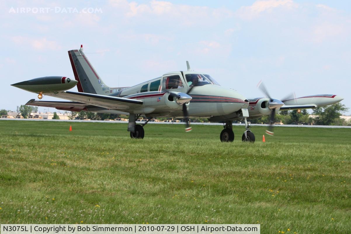 N3075L, 1965 Cessna 310J C/N 310J0075, Departing Airventure 2010 - Oshkosh, Wisconsin