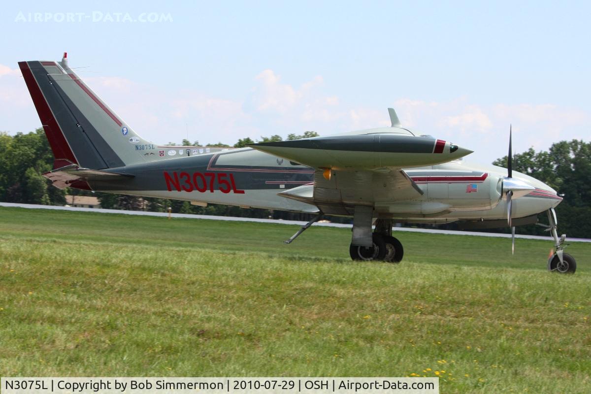 N3075L, 1965 Cessna 310J C/N 310J0075, Departing Airventure 2010 - Oshkosh, Wisconsin