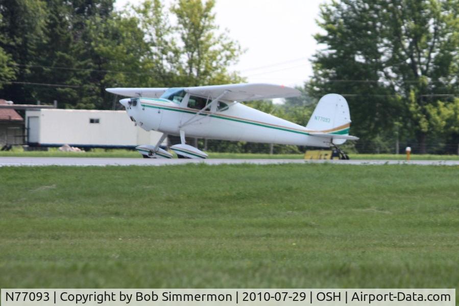 N77093, 1946 Cessna 140 C/N 11551, Departing Airventure 2010 - Oshkosh, Wisconsin