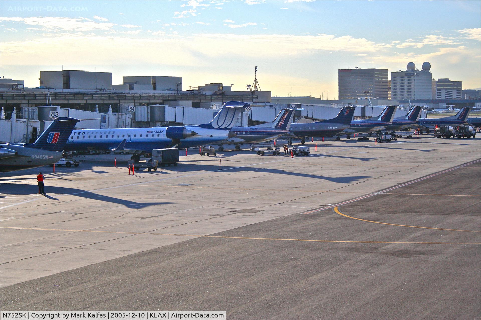 N752SK, 2005 Bombardier CRJ-701ER (CL-600-2C10) Regional Jet C/N 10209, SkyWest Bombardier CL-600-2C10, N752SK gate 83 KLAX getting ready to board to KTUS.