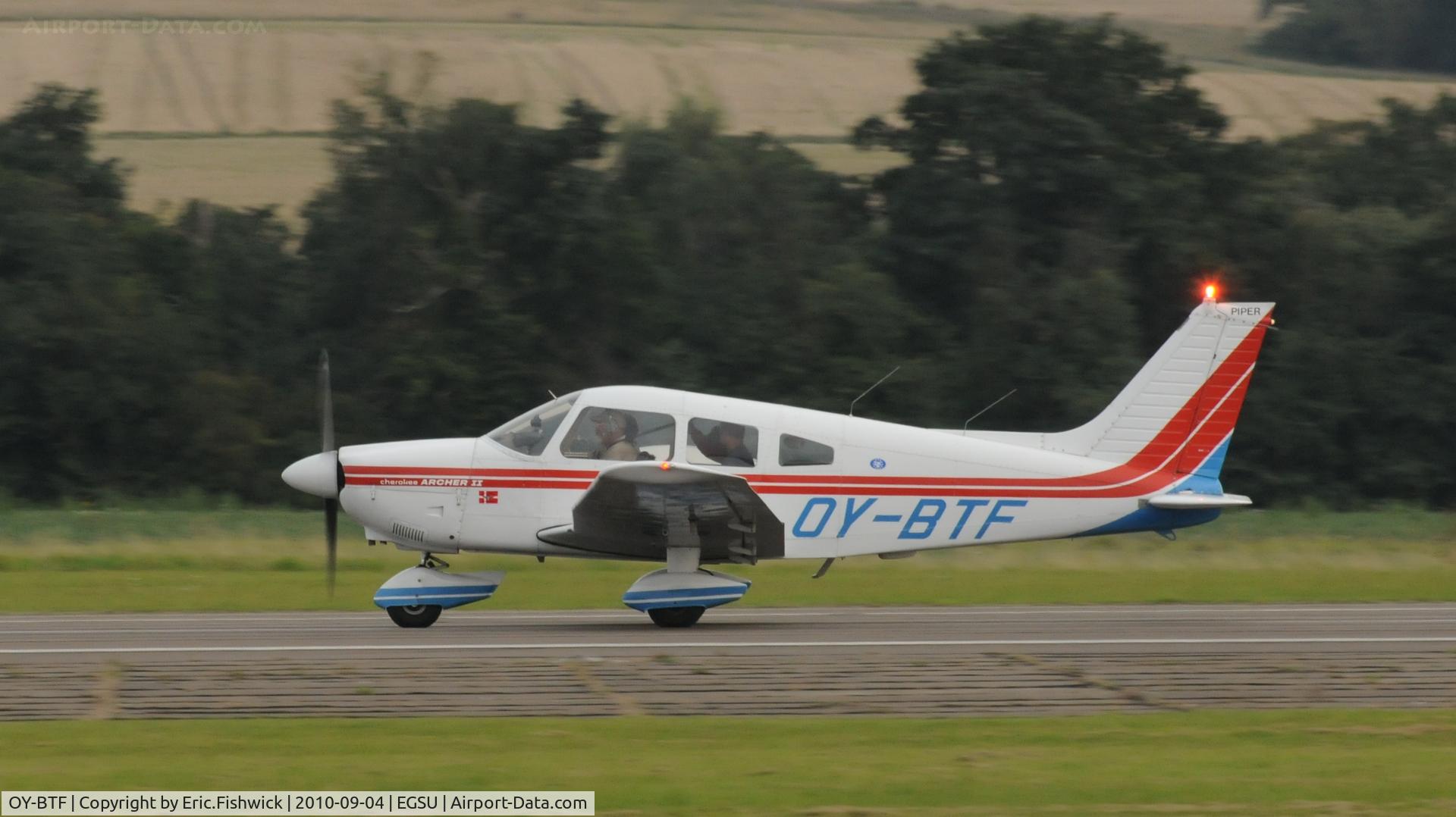 OY-BTF, 1976 Piper PA-28-181 Archer II C/N 28-7790288, OY-BTF departing IWM Duxford Battle of Britain Air Show Sep. 2010