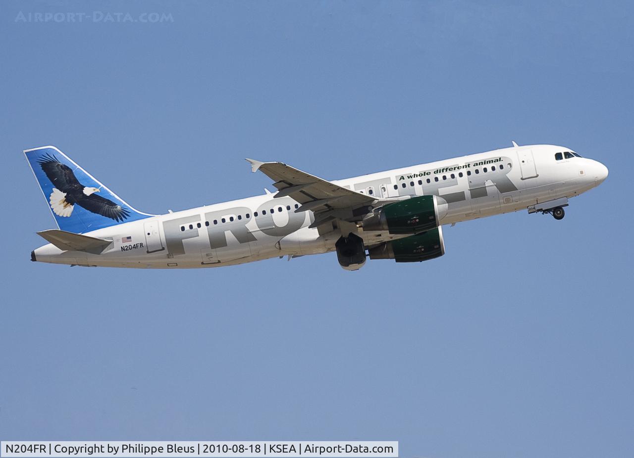 N204FR, 2004 Airbus A320-214 C/N 2325, (Frontier) Charming nature oriented western aircraft clmibing from Rwy 16L.. Gear on the move.