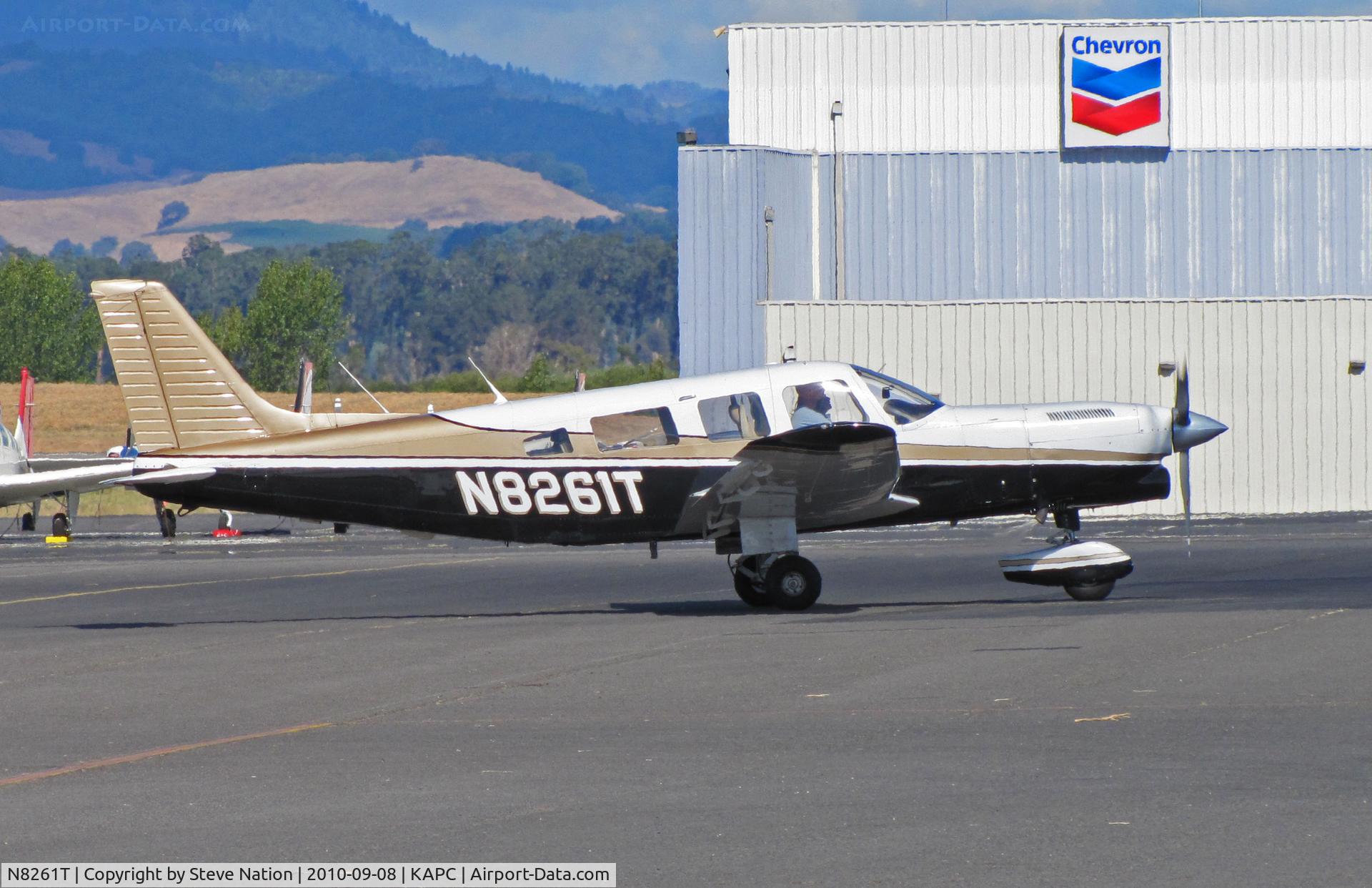 N8261T, 1980 Piper PA-32-301T Saratoga C/N 32-8024043, Very sharp 1980 Piper PA-32-301T visiting from Wyoming at Napa, CA gas pumps