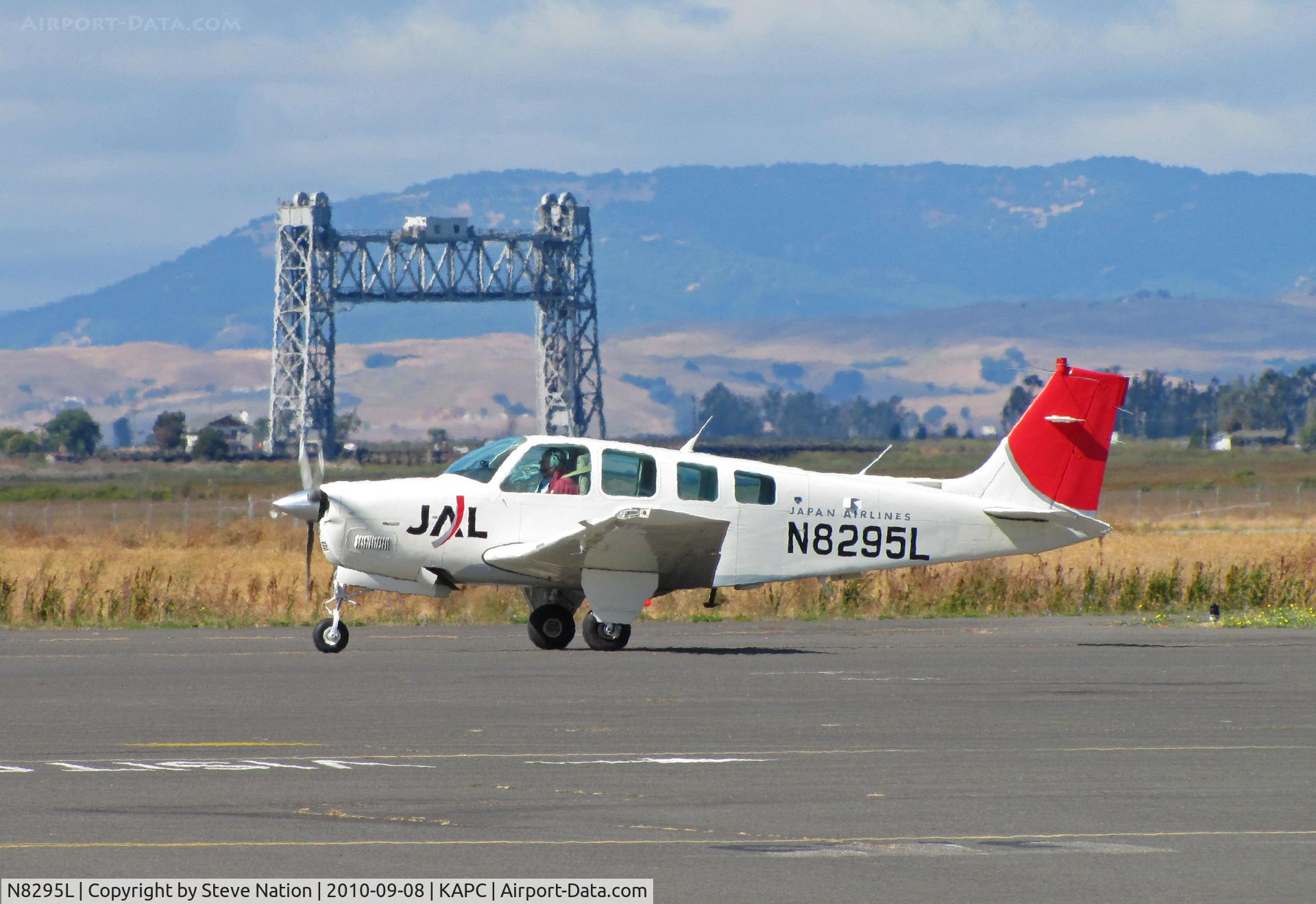 N8295L, 1992 Beech A36 Bonanza 36 C/N E-2762, Japan Airlines 1992 Beech A36 with Napa River RR Bridge in background taxis for training flight