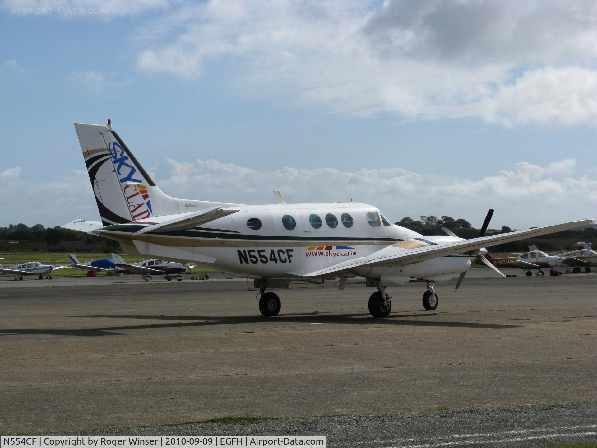 N554CF, 1973 Beech E-90 King Air C/N LW-66, Sky Clad's King Air visiting Swansea Airport.
