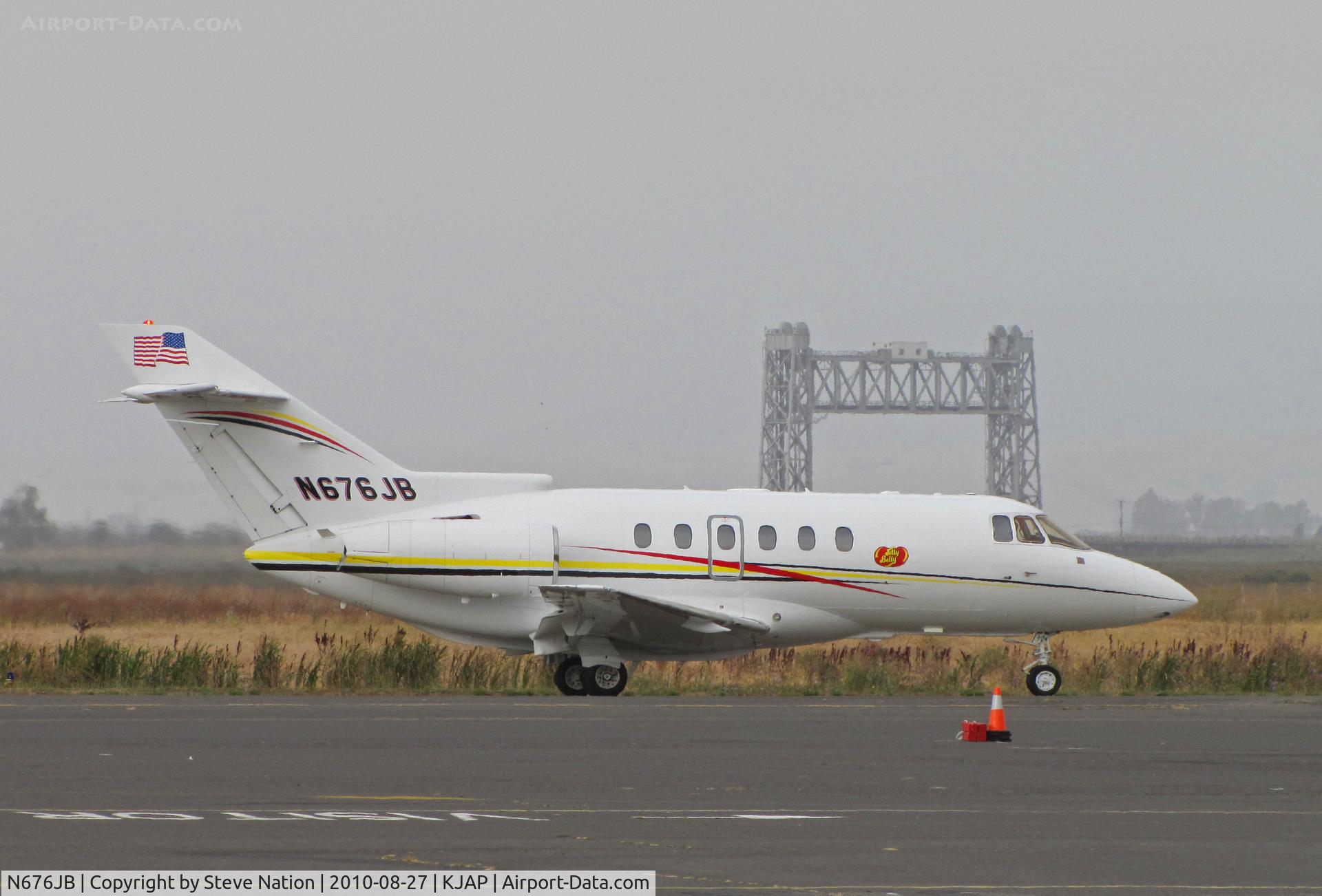 N676JB, 2003 Raytheon Hawker 800XP C/N 258619, Jelly Belly Candy (Fairfield, CA) 2003 Hawker 800XP taxing past Napa River RR bridge on departure for KGPI (Glacier Park Int'l Airport, Kalispell, MT) as 