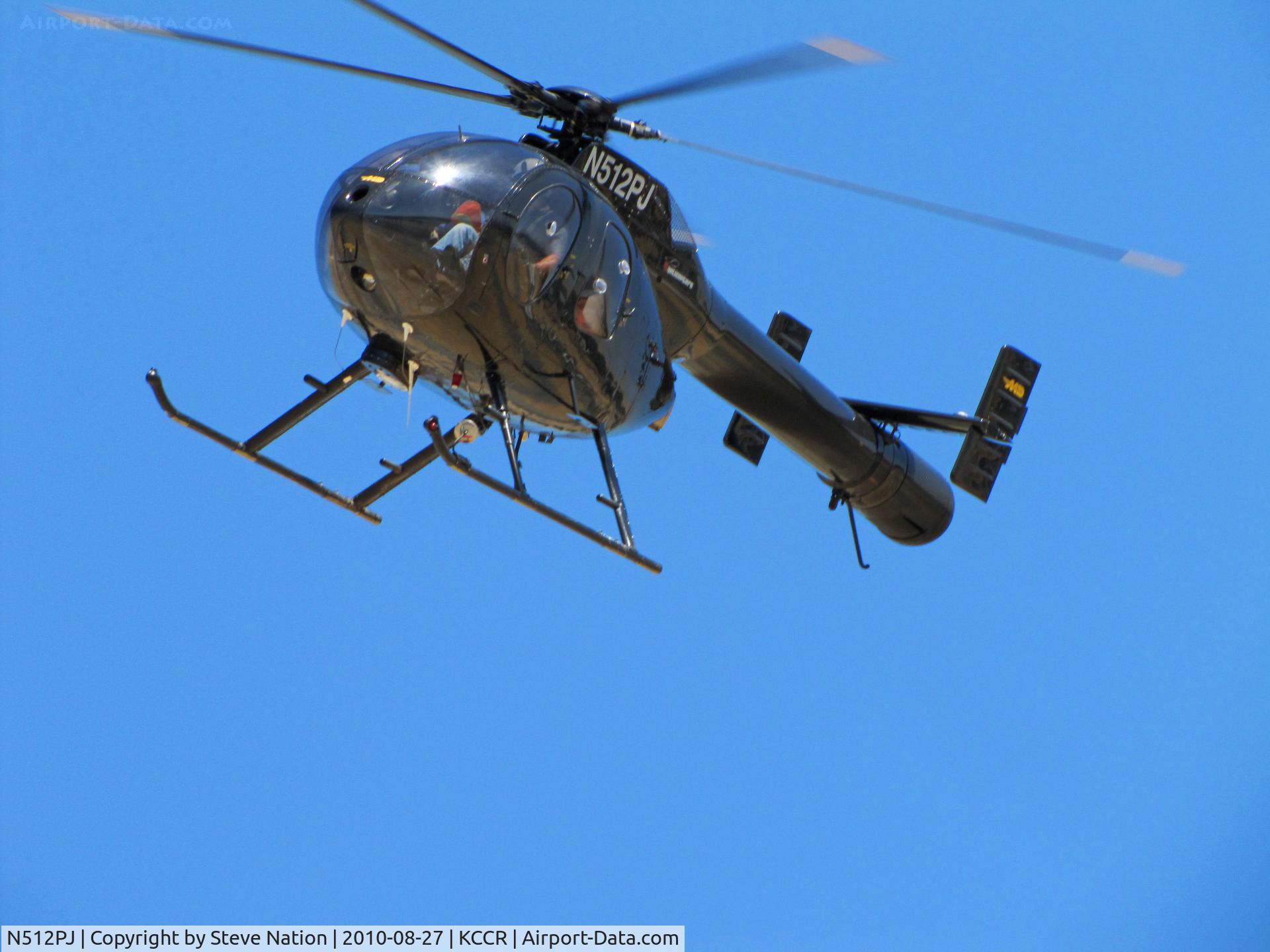 N512PJ, 1992 McDonnell Douglas 500N C/N LN020, PJ Helicopters 1992 MD-500 turning over public viewing area near tower at Buchanan Field