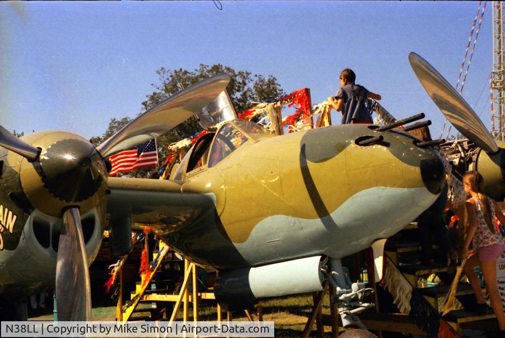 N38LL, 1930 Lockheed P-38 Lightning C/N AAF 42-104088, N38LL, Scatterbrain Kid, taken at the LAGCO exposition in Lafayette, Louisiana, in 1972