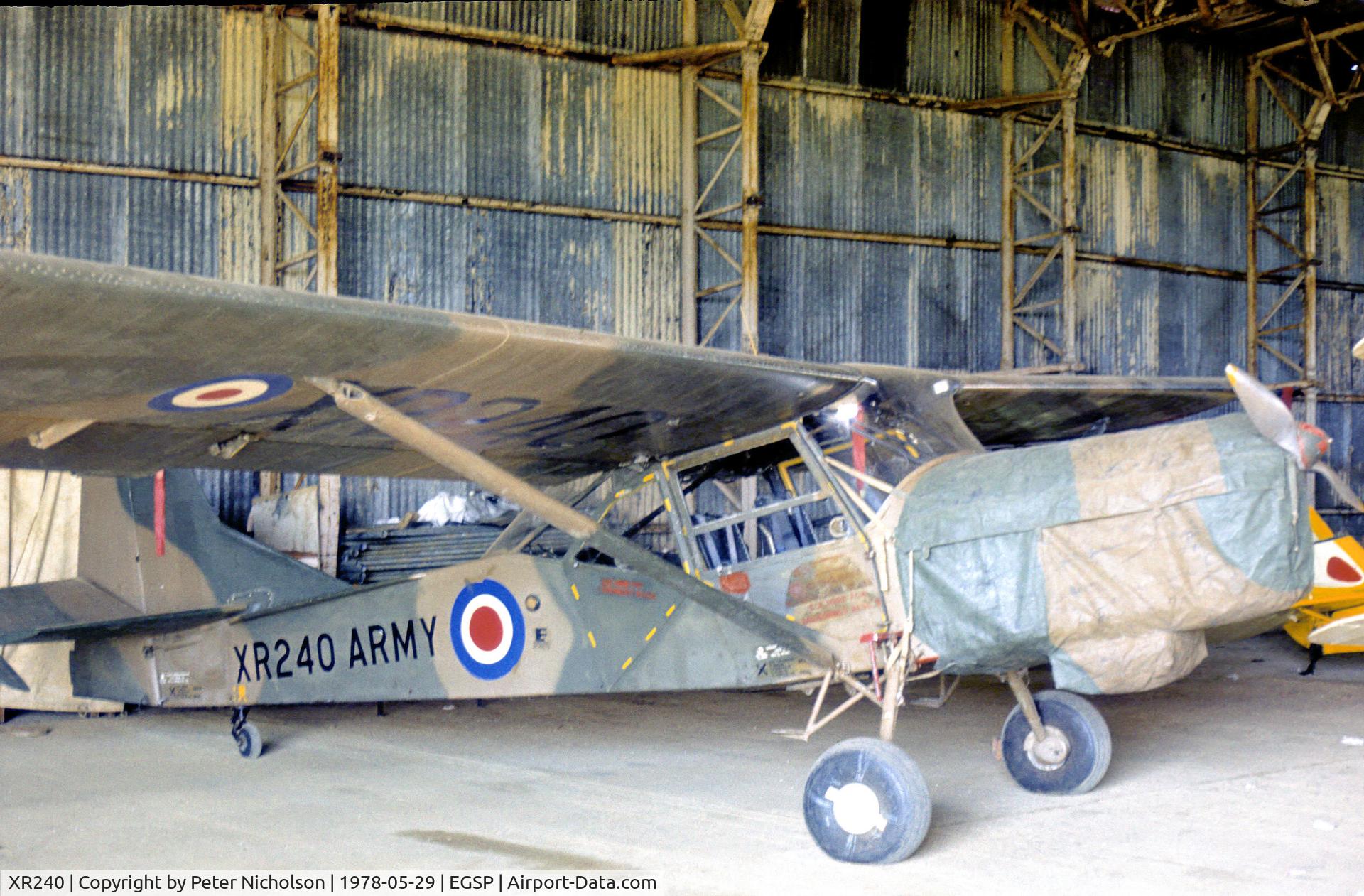 XR240, 1962 Auster AOP.9 C/N B5/10/177, Auster AOP.9 hangered at Sibson in May 1978.