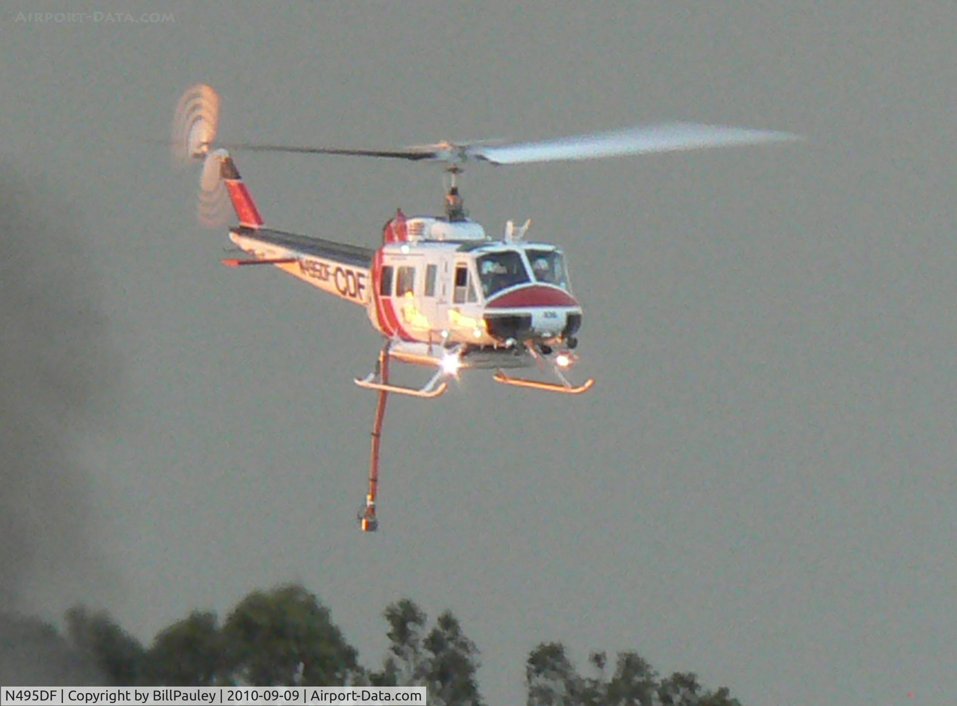 N495DF, Bell EH-1H C/N 12218, Taken at 7:14 PM, 9/9/10 above San Bruno, CA, site of massive natural gas pipeline explosion.