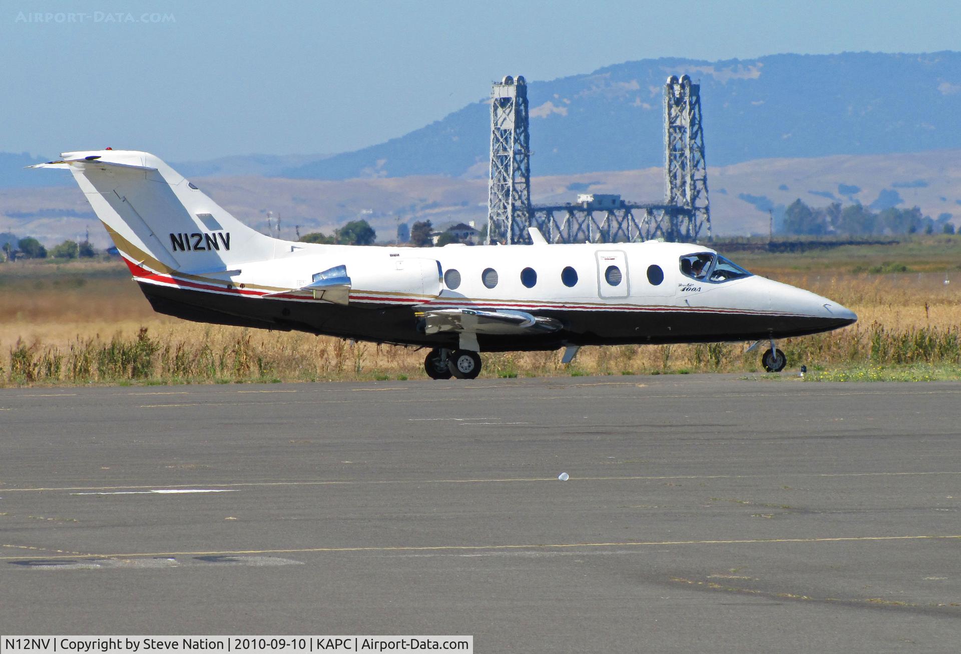 N12NV, 1998 Beech 400A Beechjet C/N RK-186, 1998 Beech 400A passes Napa River RR bridge on way to RWY18R