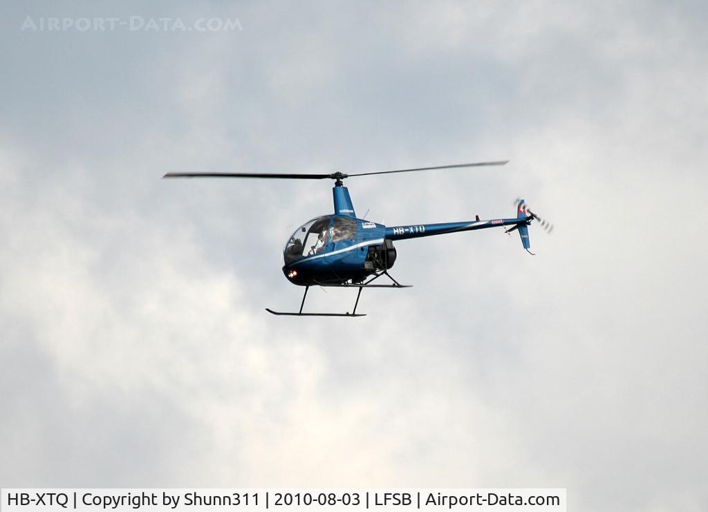HB-XTQ, 1989 Robinson R22 Beta II C/N 1014, Passing above the airport...