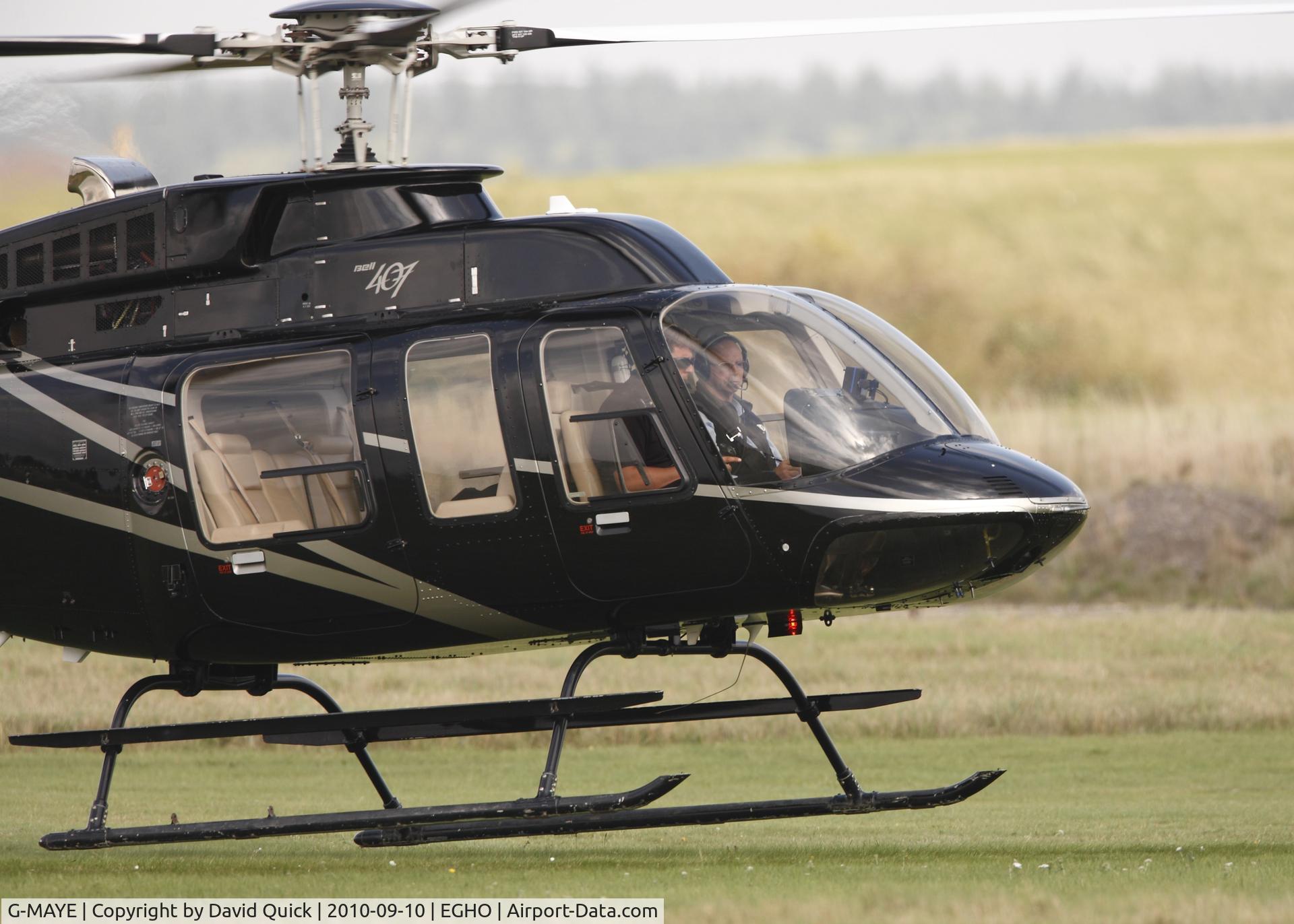 G-MAYE, 1997 Bell 407 C/N 53117, Seen from Hampshire Air Ambulance helipad at Thruxton while undertaking compass swing.