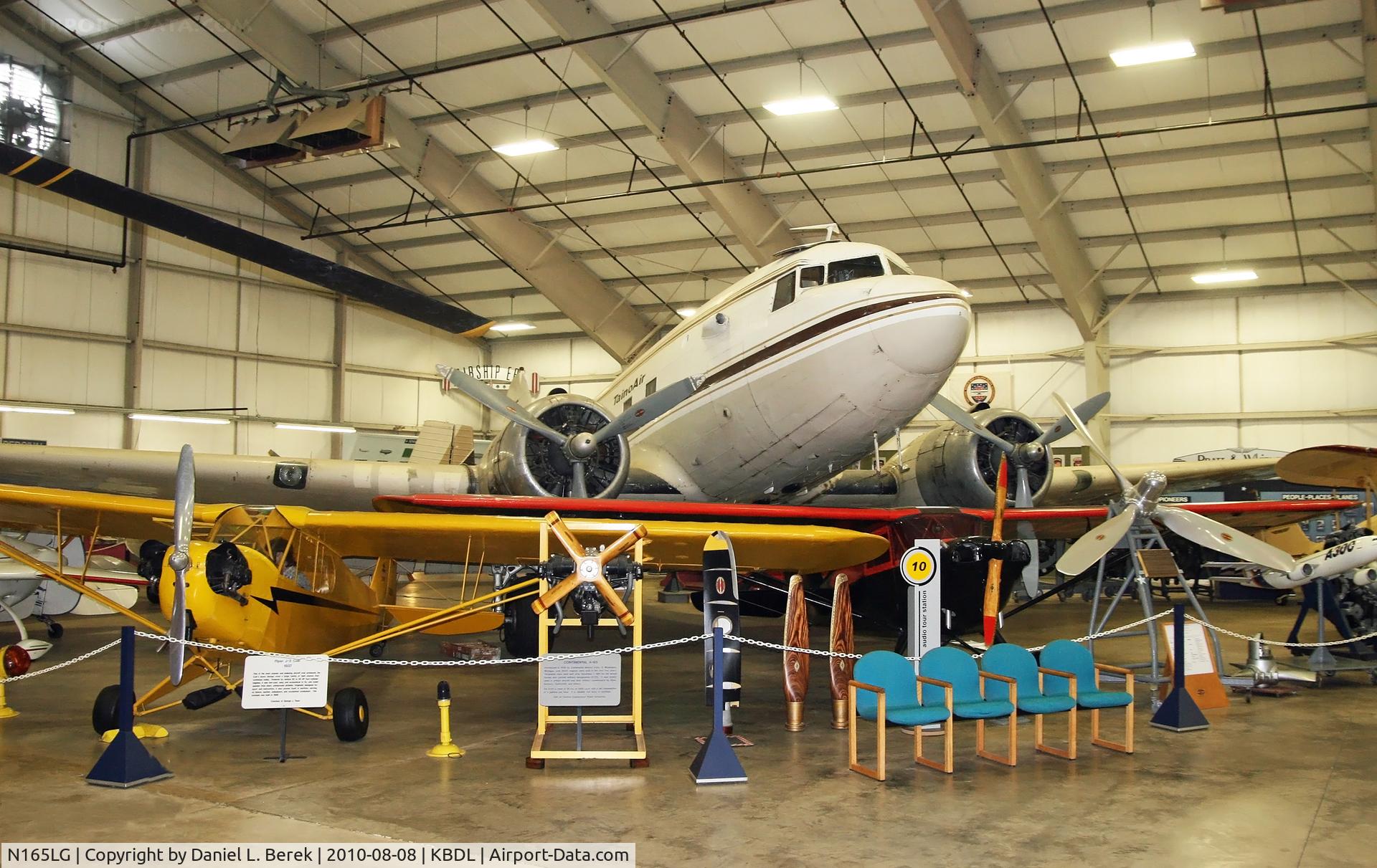 N165LG, 1942 Douglas DC-3-G202A (C-49J) C/N 6314, The NEAM Douglas DC-3, originally a USAAF C-49J, towers over a host of Golden Age jewels.