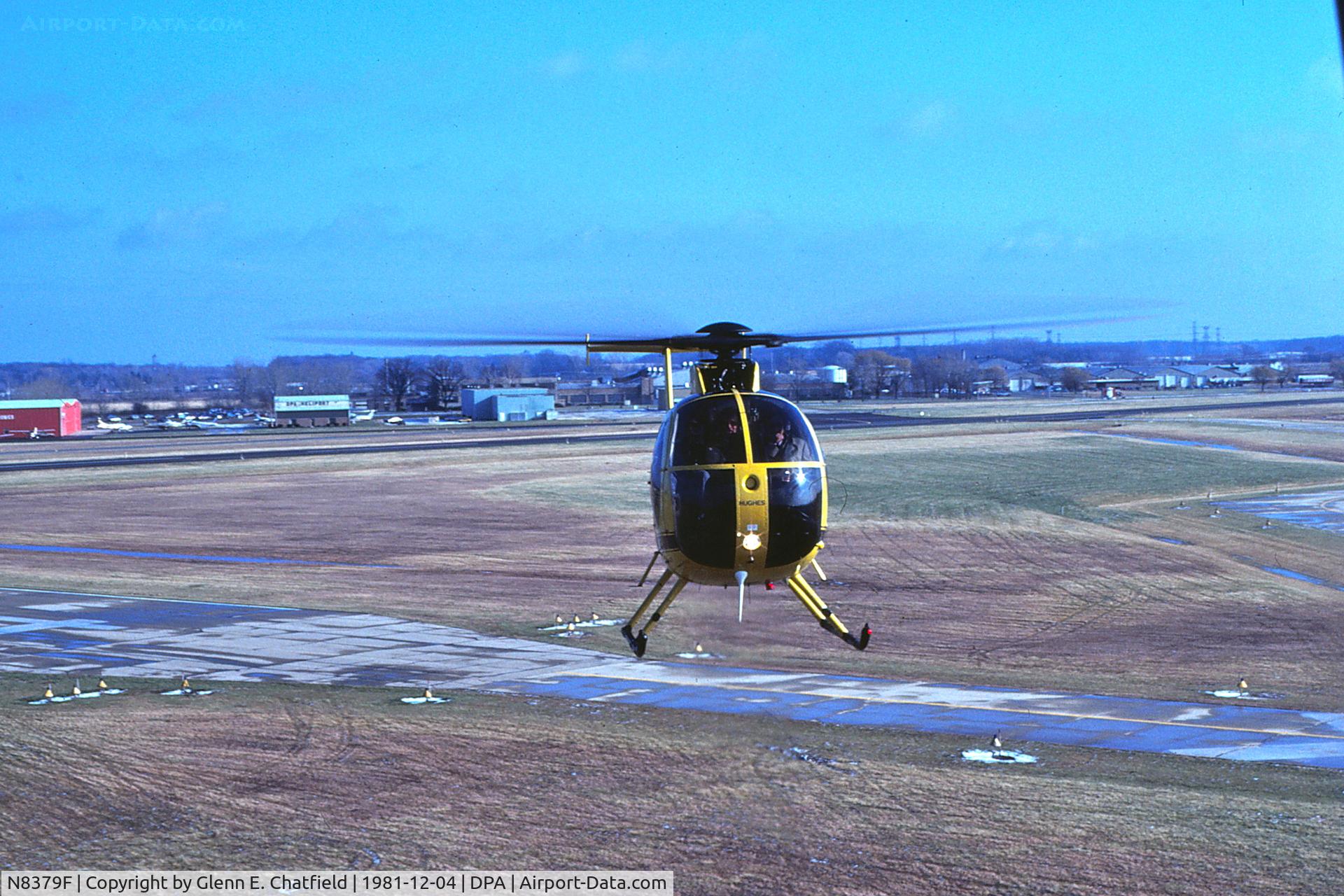 N8379F, 1978 Hughes 369D C/N 480291D, Looking SE from the control tower - the chopper was giving rides to the controllers